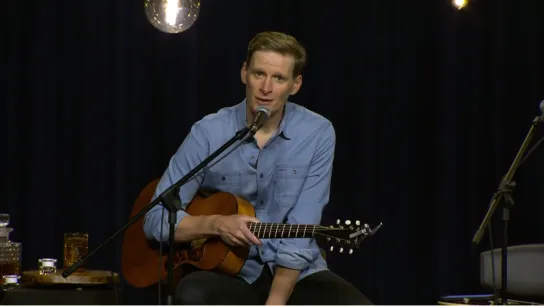 Singer/Songwriter Patrick Davis with his guitar